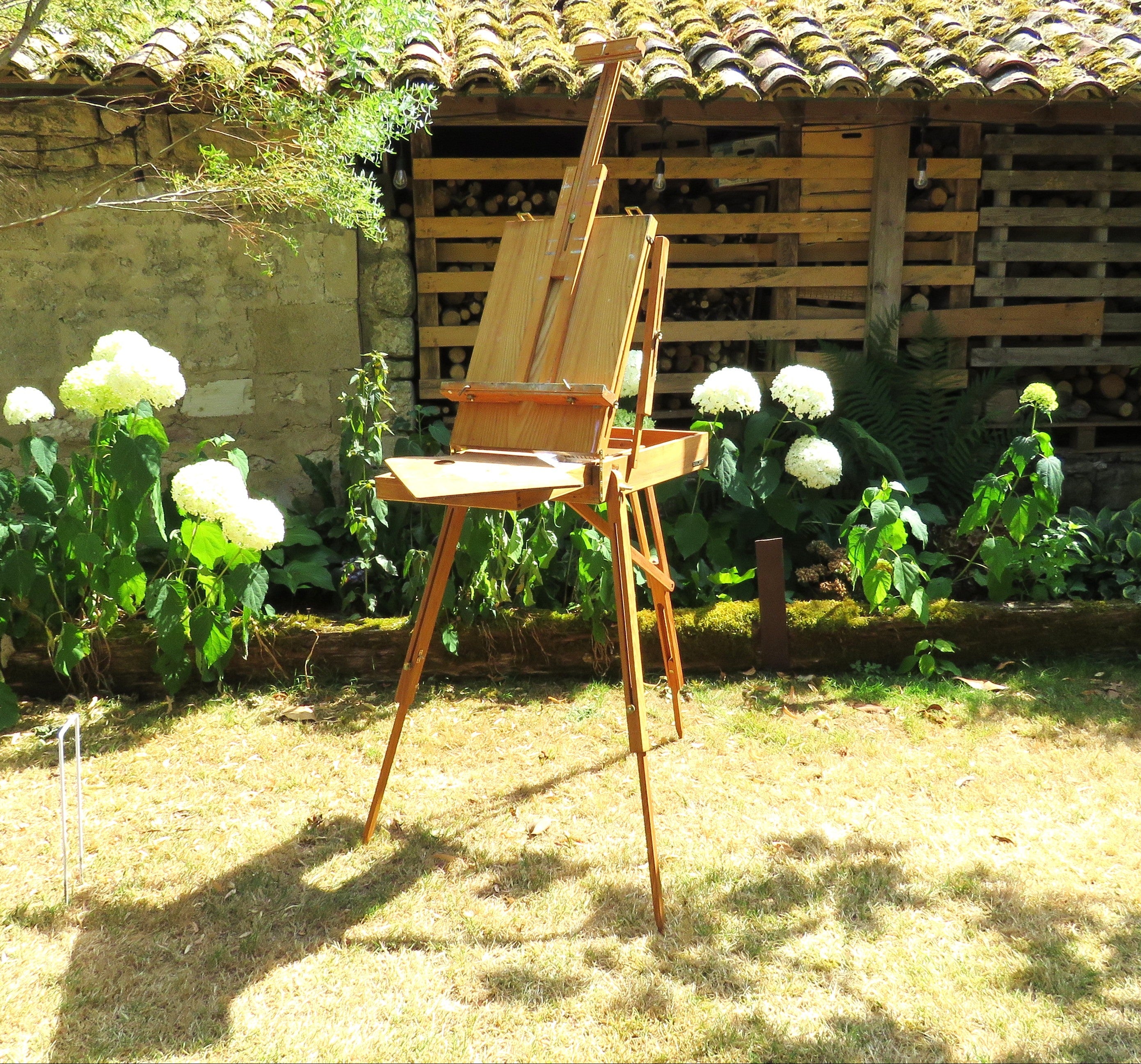 Vintage French Manet Artist's Field Easel & Painting Box on garden background