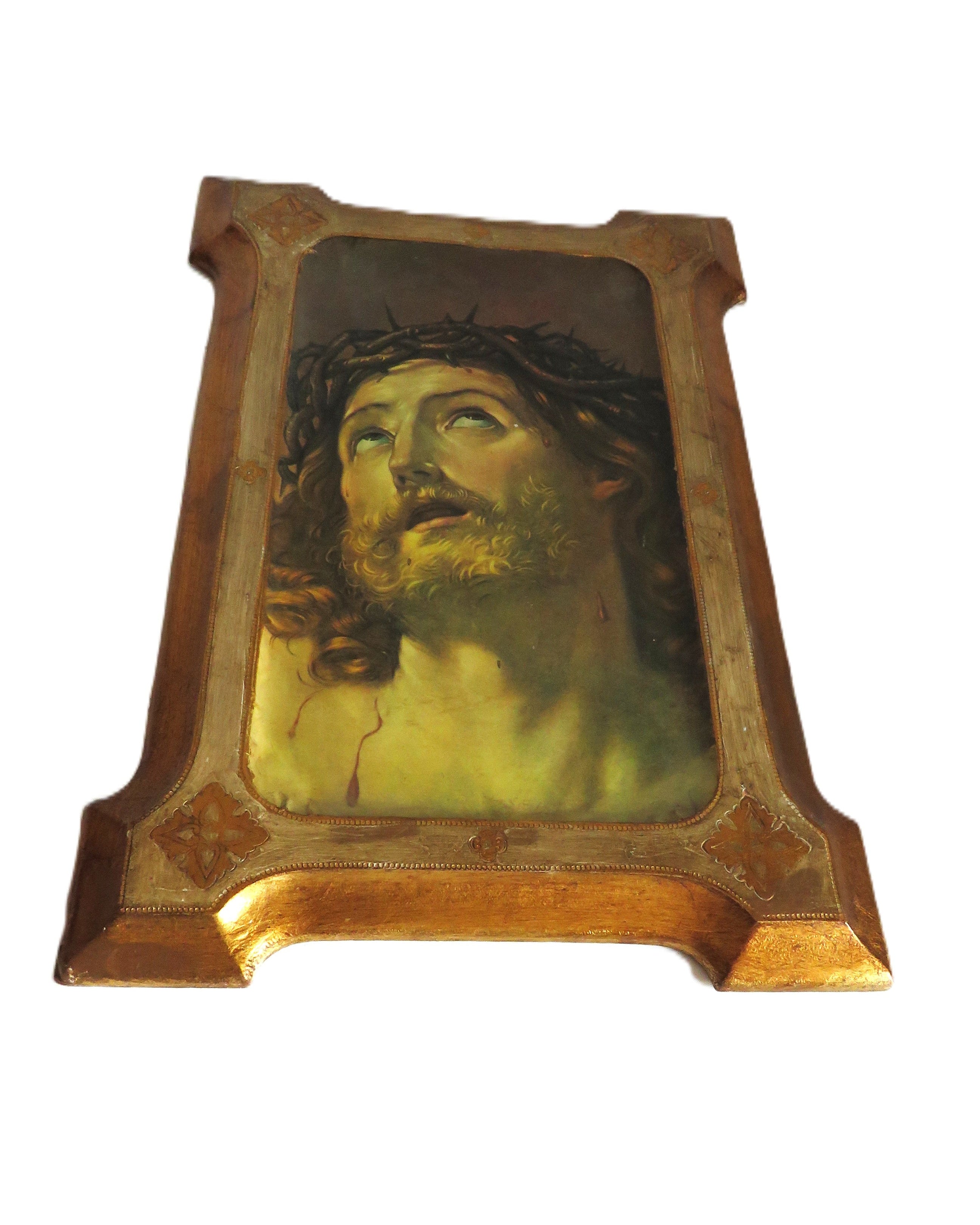 Vintage portrait of a Christ with a crown of thorns in a wooden frame on a white background