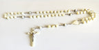 Mother of pearl rosary with large beads on a  white background
