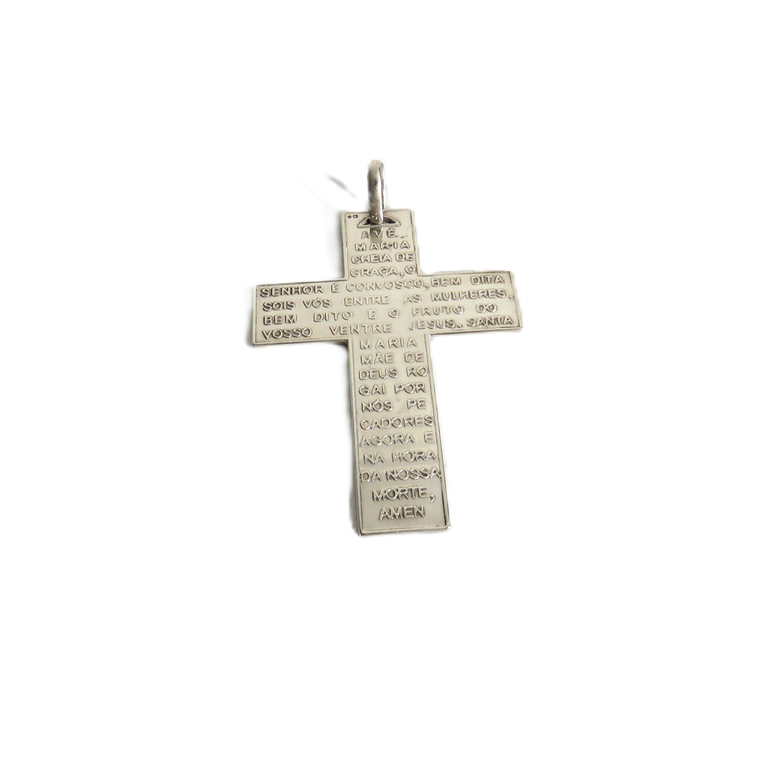 A silver cross pendant engraved with the Lord's Prayer, shown against a plain white background.