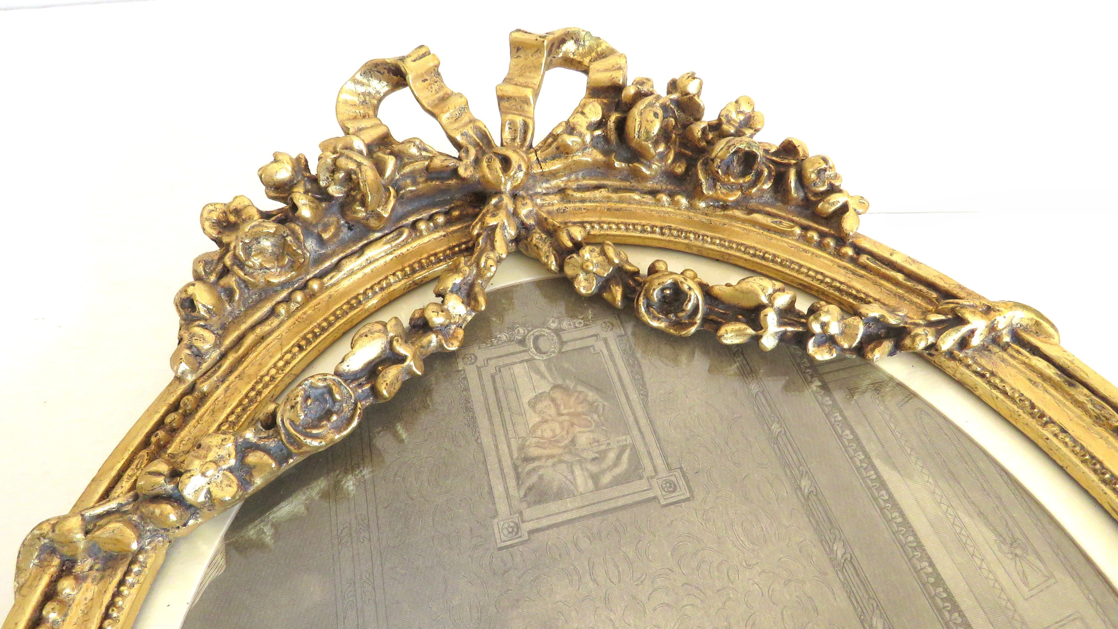 Top of a gold carved gilt frame