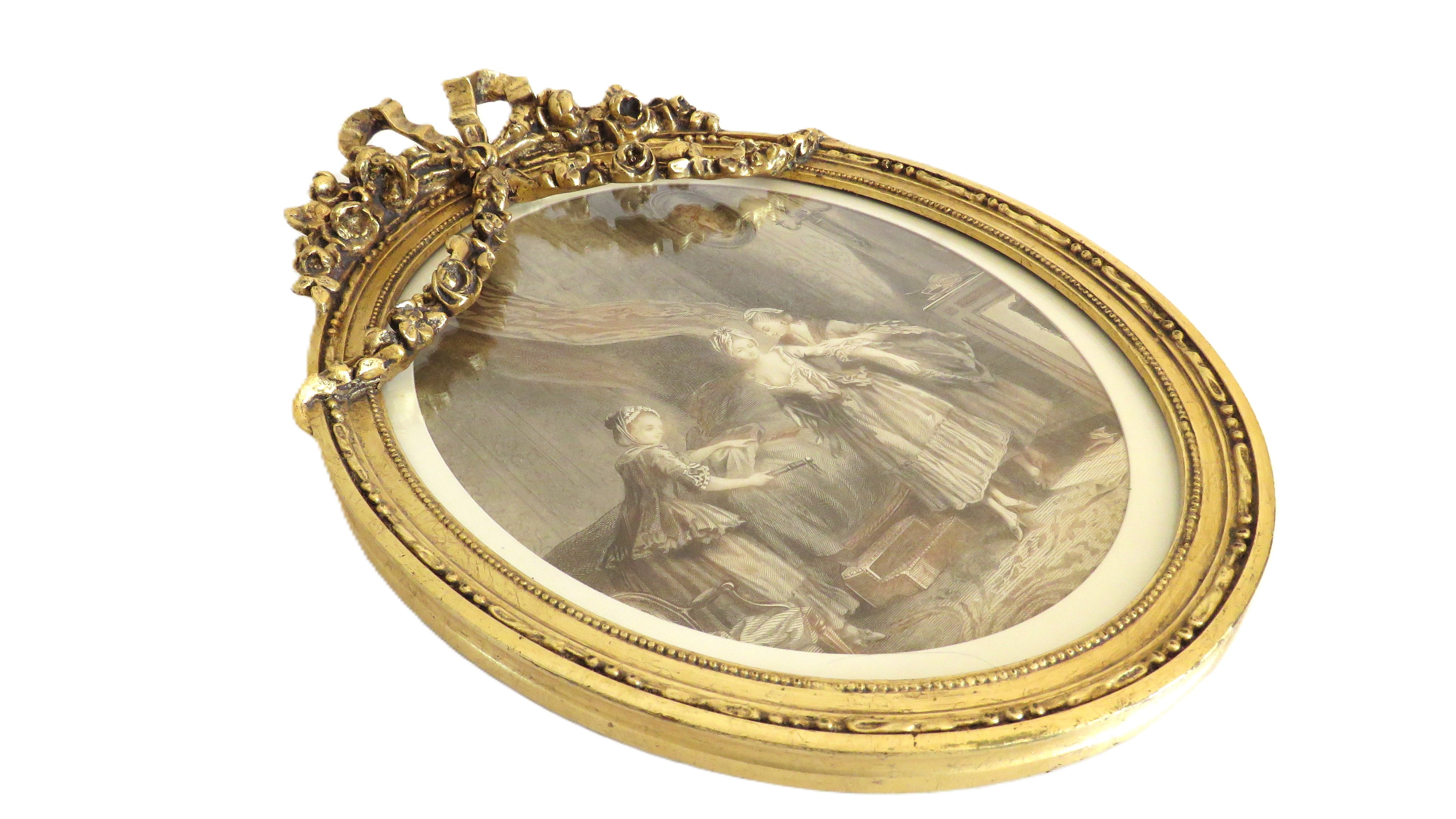 Decorative gold frame with a portrait inside on a white background