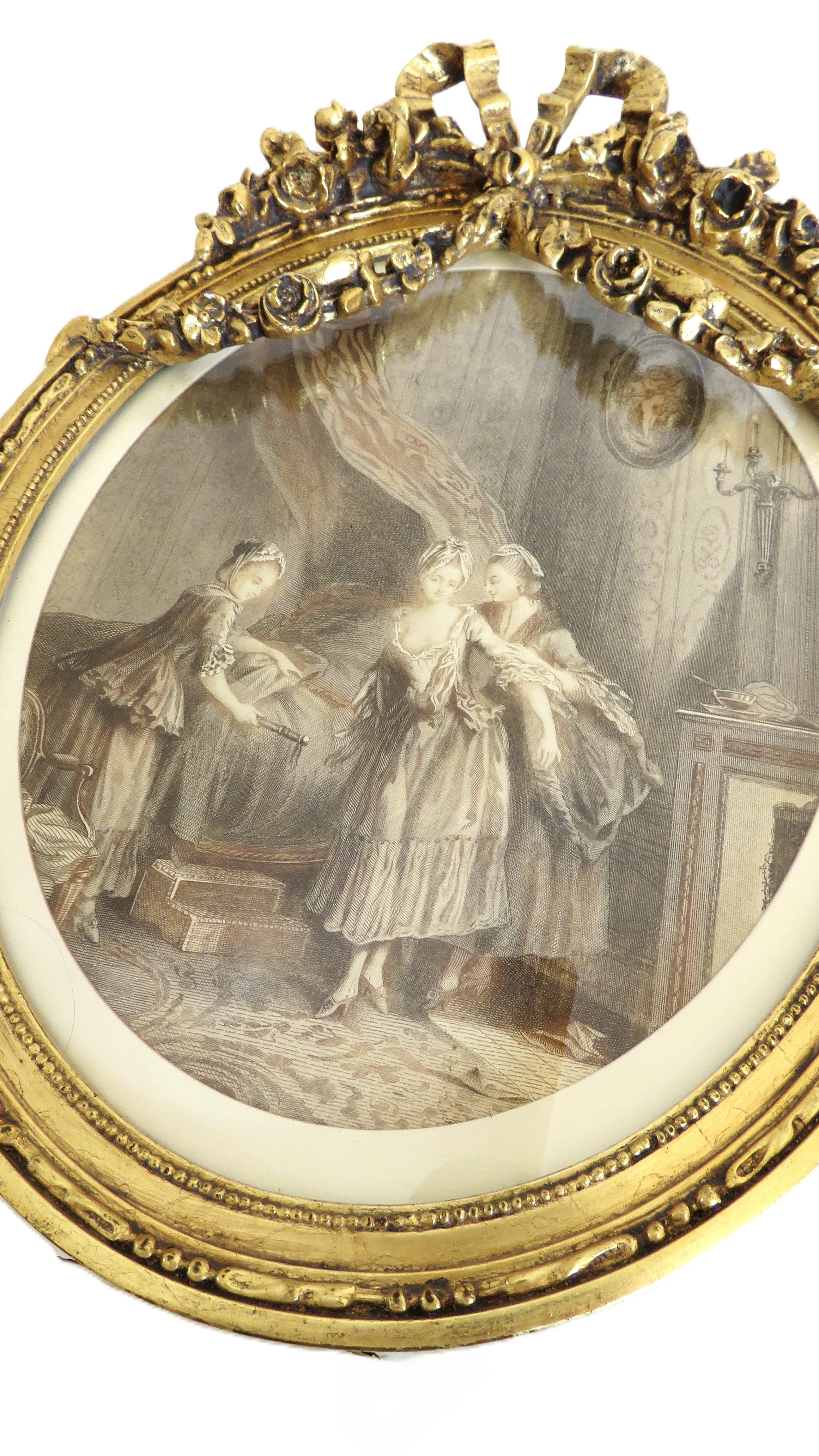 Decorative oval frame with classical scene and gold frame