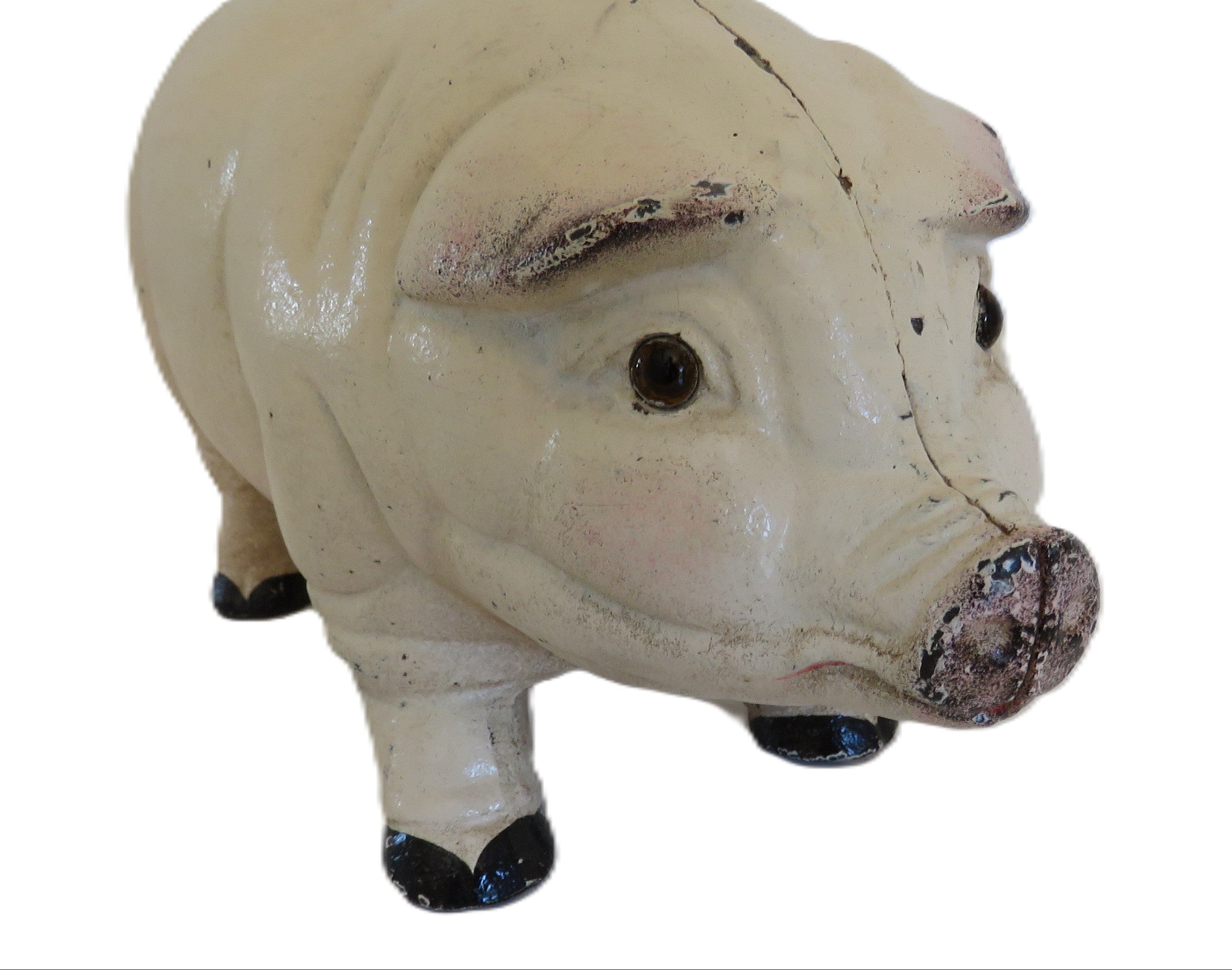 Vintage cast iron  piggy bank on a white background