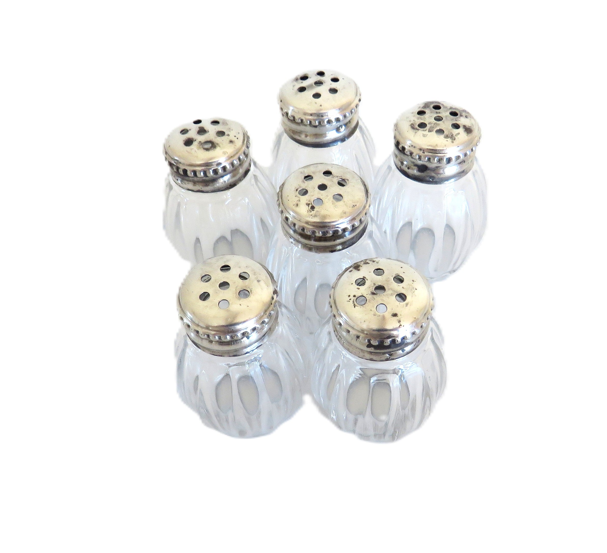 Christofle six silver salts on a white background