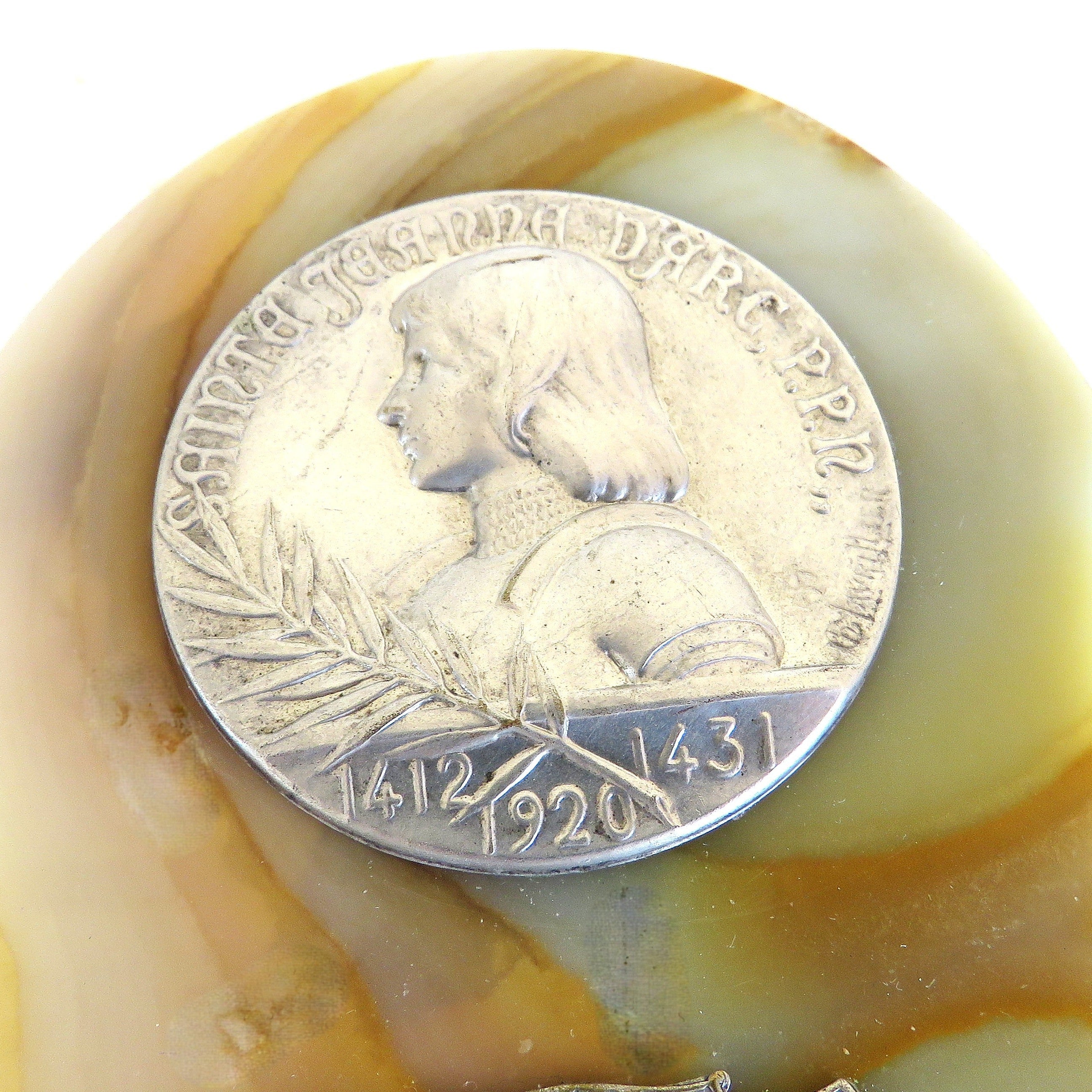Silver Joan of Arc on a Onyx back