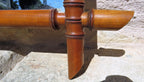 corner of a Antique French Faux Bamboo Mirror on a stone wall
